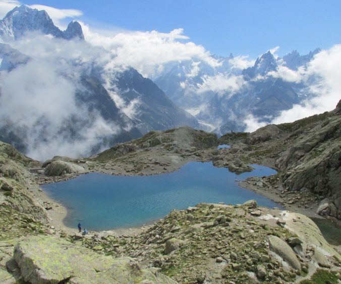 High alpine lake, Lac Blanc, with snowy mountains in the background