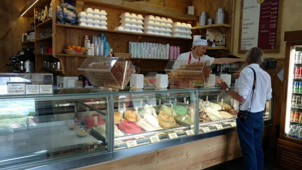 Gelato store with multicolored gelato
