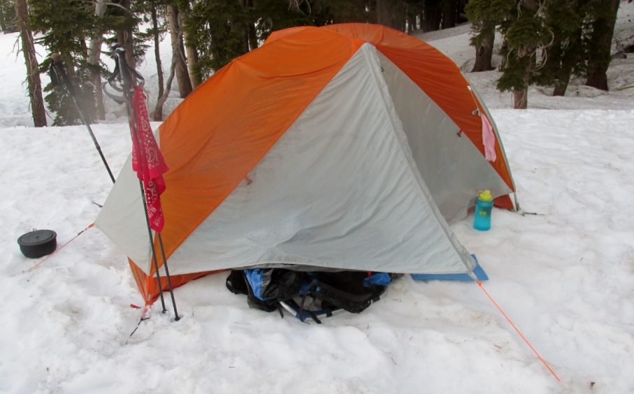 Tent staked out in snow