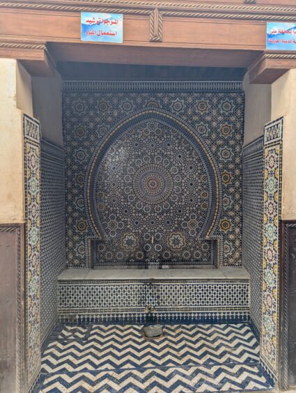 Tiled seating area in blue and yellow hues