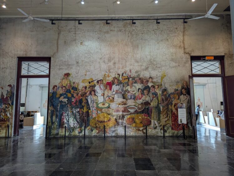 A colorful mural painted on the wall of the museum.